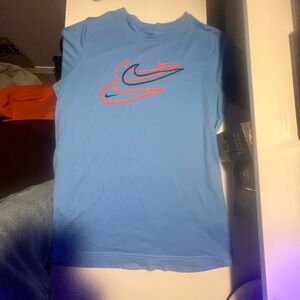 Blue nike running shirt. Small, Men worn a couples of times enjoy